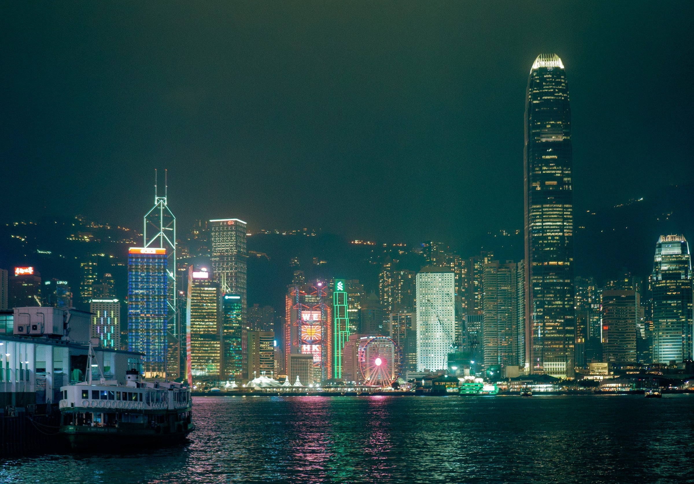 Victoria Harbour and the Hong Kong skyline at night